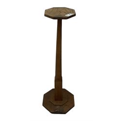 Dolphinman - oak stand with octagonal top and base, carved with Dolphin signature, by Peter Dinky Daynes (H89cm); Hepplewhite design bed post standard lamp, acanthus capital with spiral turned column (H164cm) (2)