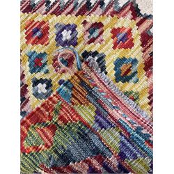 Chobi Kilim ivory ground runner rug, the field decorated with three multi-coloured lozenges, each with central geometric decoration, the border with further diamonds of alternating colour