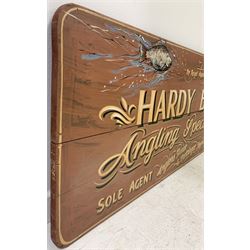 Hand painted shop sign advertising Hardy Bros Ltd By Royal Appointment to H.M. The King, Angling Specialists Alnwick, England - Anglers Guide & Catalogue Supplied Sole Agents 61 Pall Mall, London' 53cm x 167cm