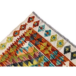 Chobi Kilim ivory ground rug, the multi-coloured field decorated with two central concentric lozenges and surrounded by geometric shaped in contrasting colours