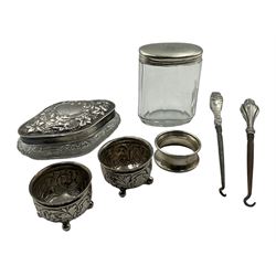 Pair of Victorian silver open salts with acanthus embossed decoration by Horace Woodward & Co, London 1890, Edwardian silver mounted glass dressing table jar of quatrefoil form, another jar, serviette ring and two silver handled button hooks