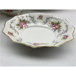 Royal Albert 'Tranquillity Rose' pattern part dinner service comprising eight dinner plates, ten side plates, eight dessert bowls, sauce boats, serving platters and other items (83)