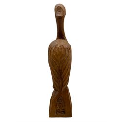 'Gnomeman' carved oak figure of a wading bird, naturalistic base carved with gnome signature on reverse, by Thomas Whittaker of Littlebeck, H33cm