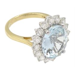 Gold oval aquamarine and round brilliant cut diamond cluster ring, hallmarked 14ct, aquamarine approx 4.98 carat, total diamond weight approx 1.30 carat, with Independent Diamond Grading laboratories report