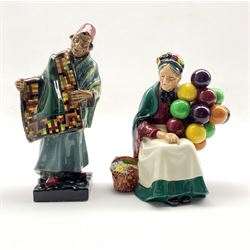 Royal Doulton figure 'The Carpet Seller' HN1464 and another 'The Old Balloon Seller' HN1315