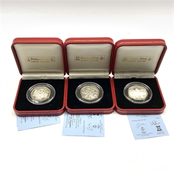 Queen Elizabeth II 1993, 1995 and 1996 Isle of Man silver proof Christmas fifty pence coins, all cased with certificates