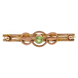Early 20th century rose gold peridot brooch, stamped 9ct 