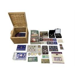 Great British and World coins and banknotes, including Great Britain 1970 year set, 1999 and 2004 UK brilliant uncirculated coin collections, commemorative crowns, Ireland 1971 coin year set in green folder, Canada 1975 coin set in red case, pre-Euro coinage etc, in one box