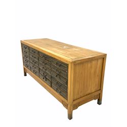 Chinese hardwood multi drawer sideboard, fitted with twenty drawers, raised on stile supports W135cm