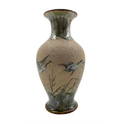 Doulton Lambeth stoneware vase by Florence Barlow, baluster form painted in pâte-sur-pâte with geese in flight, inscribed FEB and numbered 905 H28cm