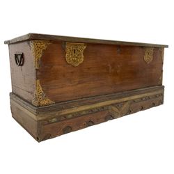 19th century European hardwood chest or coffer, rectangular hinged top enclosing candle box, bound with pierced brass fretwork fittings, the plinth base carved and painted with central butterfly motif