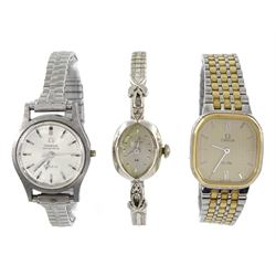 Omega De Ville ladies stainless steel and gold-plated quartz bracelet wristwatch, Ref. 1387, Omega Genève ladies automatic wristwatch and a Hamilton 14ct white gold ladies diamond manual wind wristwatch, both on expanding straps