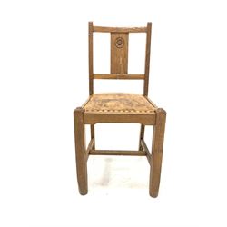 Yorkshire oak style dining chair, shaped back rail over Yorkshire rose carved splat, leather upholstered seat pad, raised on square supports united by stretcher W40cm