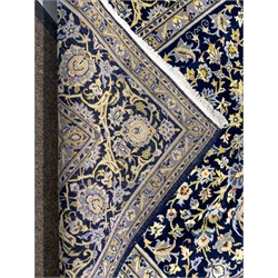 Persian Keshan blue ground rug carpet, central medallion, field decorated with interlacing floral and foliage design, repeating border, 345cm x 230cm