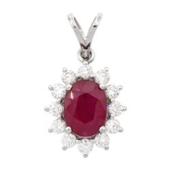 18ct white gold oval cut ruby and round brilliant cut diamond cluster pendant, ruby approx 0.75 carat, total diamond weight approx 0.40 carat