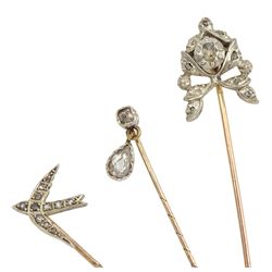 Three Victorian silver and gold diamond stick pins including swallow and an  old cut diamond with pear shaped drop of approx 0.30 carat