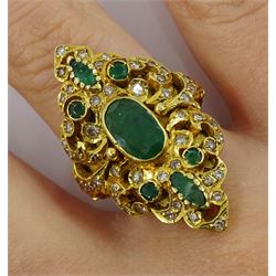 18ct gold emerald and diamond ring, vari-cut emeralds and round diamonds, in an openwork setting, stamped 750