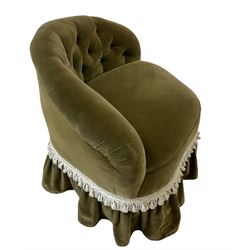 Victorian tub chair, upholstered in green buttoned back fabric, raised on turned supports, terminating in ceramic castors 