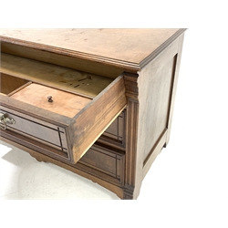 Edwardian walnut chest, with arched raised back and moulded top over three drawers carved with incised geometric design, the top drawer fitted with compartmentalised storage, raised on castors, 