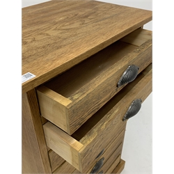 20th century light oak filing chest, fitted with eight drawers, raised on plinth base, W55cm, H94cm, D41cm