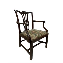 Georgian carver chair, the carved cresting rail over pierced splat back and drop in seat pad, raised on square supports 