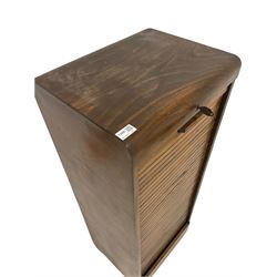 Early 20th century vintage filing cabinet, the tambour falling front opening to reveal adjustable shelves, raised on square supports W44cm, H115cm. D36cm