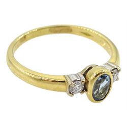 18ct gold three stone oval aquamarine and round brilliant cut diamond ring, London 1996