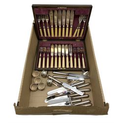 Cased set of twelve plated fish knives and forks, six plated serviette rings, table knives etc
