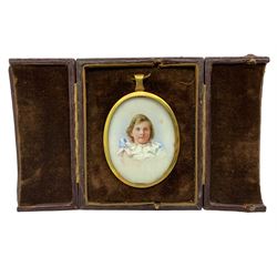 Early 20th century miniature portrait, half-length watercolour on ivory of a young girl wearing ruffled collar blue dress in leather case. 6cm x 4cm This item has been registered for sale under Section 10 of the APHA Ivory Act 