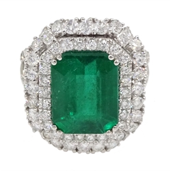 18ct white gold emerald and double halo diamond cluster ring, with diamond set shoulders, hallmarked, emerald 4.86 carat, total diamond weight approx 1.70 carat