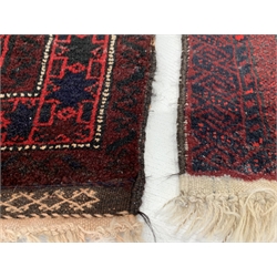  Afghan Belouch prayer rug, central mihrab panel enclosed by guarded border, (80cm x 146cm) together with another similar rug, (77cm x 120cm)  