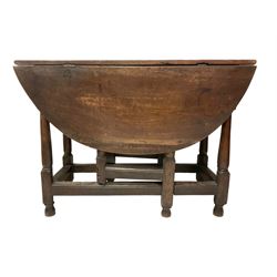 17th century oak gate-leg breakfast table, oval drop-leaf top raised on turned supports united by stretcher