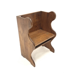 Pitch pine single seat pew, with seat panel raised on shaped panel end supports, W62cm