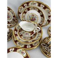 Royal Albert 'Lady Hamilton' pattern table service, comprising six teacups & saucers, six coffee cups & saucers, sugar bowl, milk jug, six tea plates, six side plates, six dinner plates, six breakfast bowls, six fruit bowls, six soup bowls, large serving bowl, serving jug on stand, butter dish cover, oval platter, sandwich plate, three tureens and six egg cups 