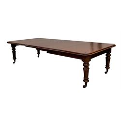 Victorian mahogany wind out extending dining table, rectangular moulded top with three additional leaves, raised on turned fluted supports with brass cup and ceramic castors 302cm x 138cm, H74cm (Max)