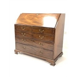  George III mahogany bureau, fall front revealing interior fitted with cupboard, cubbies drawers and baize lined surface, over two short and two long drawers, raised on ogee bracket supports, W116cm, H112cm, D56cm  