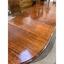Large Victorian mahogany extending dining table, 'D' ended, with four additional leaves, raised on tapering turned and fluted supports with brass cup and ceramic castors,   146cm x 175cm, H72cm (Closed) L375cm when extended