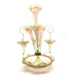 Victorian pink and green glass epergne with four trumpet shape vases and three suspended baskets with crimped rims on circular dished base H51cm