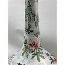Large Japanese porcelain bottle vase, painted in pastel enamels with a continuous river landscape featuring Mandarin Ducks, birds in flight, rockwork, houses and mountains beyond, six-figure character mark beneath, on hardwood stand, H64cm 