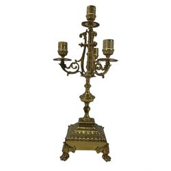 20th century gilt brass four branch candelabra, H42cm together with a ruby overlay glass dessert set, comprising two serving bowls and eleven dessert bowls 