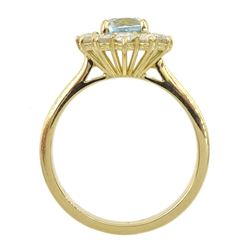 18ct gold oval aquamarine and round brilliant cut diamond cluster ring, hallmarked, aquamarine approx 0.90 carat, total diamond weight approx 0.60 carat