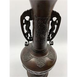 Japanese patinated bronze twin-handled vase decorated in relief with birds and foliage, H45