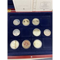 Commemorative coins and medallions including six silver gilt hallmarked medallions etc, housed in two display cases