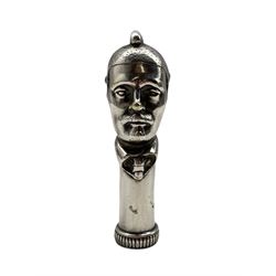 Early 20th century silver-plated walking stick grip, cast in the form of a man wearing a helmet with comb cresting, H12cm 