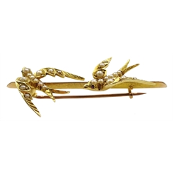 Victorian gold swallow bar brooch, both set with ruby eyes, in velvet lined box