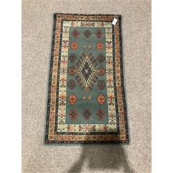 small green ground rug