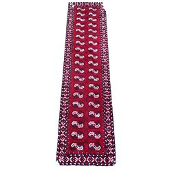 Thick pile hand woven runner, repeating blue and white gul motif on red field, enclosed by border 365cm x 93cm