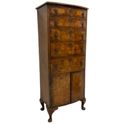 Georgian design narrow figured walnut bow-front chest, fitted with four graduating drawers, each with crossbanded facias and drop handles, over a double cupboard fitted to base, raised on cabriole supports
