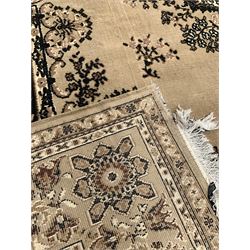 Persian design English beige ground rug centred by floral medallion 380cm  x 280cm