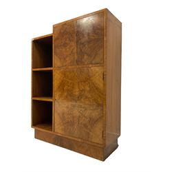 Art Deco walnut combination bookcase and correspondence bureau, fitted with fall-front enclosing fitted interior with drawer, over single cupboard door with two shelves